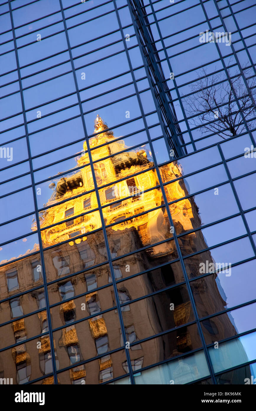 Early morning reflection of the Crown Tower in the glass of the Trump Tower in Manhattan, New York City, USA Stock Photo
