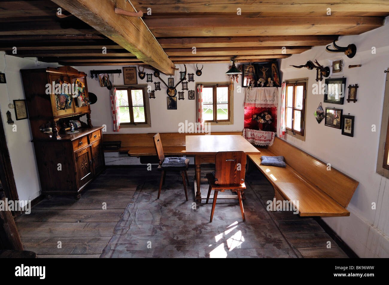 Room With A Bench Table Chairs And Family Altar Glentleiten Stock Photo Alamy