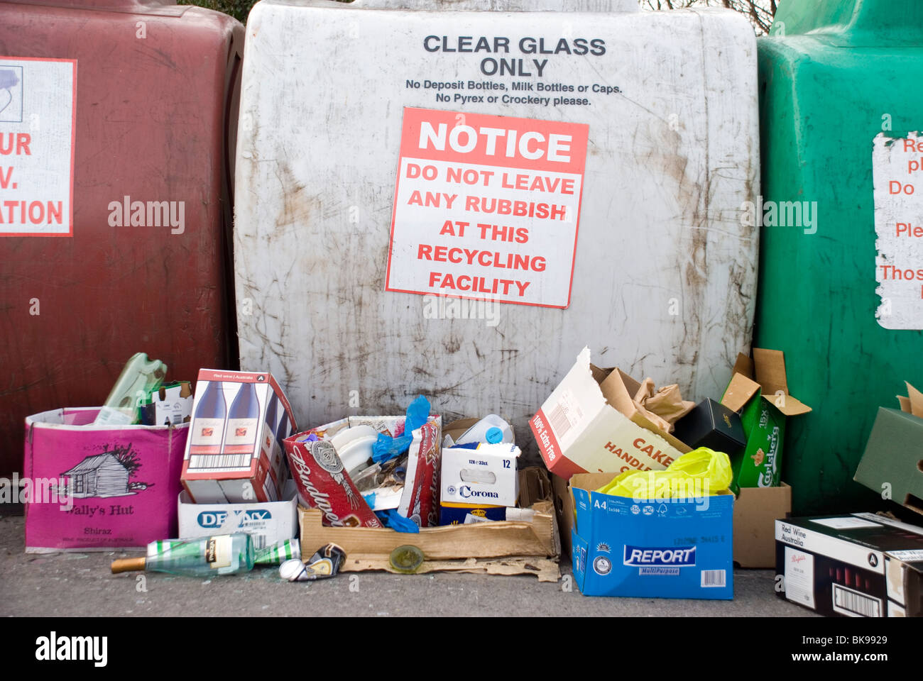 Rubbish dumped illegally by recycling bins Stock Photo
