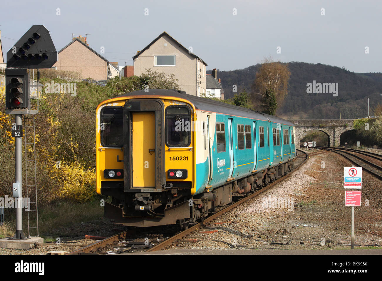 Class 150 diesel multiple unit leaving Llandudno Junction station with