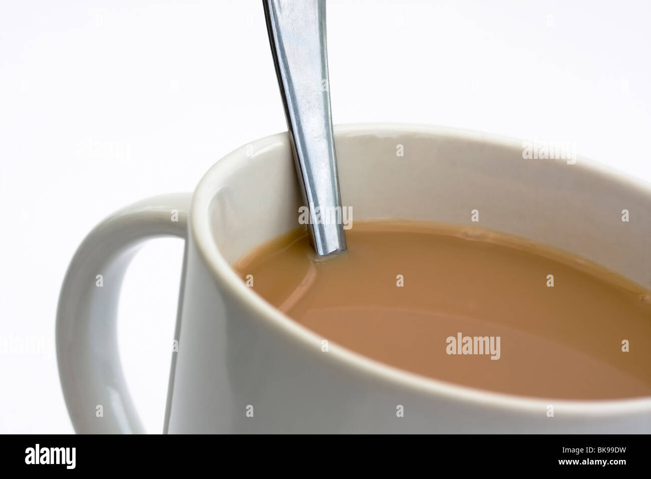 cup of tea with spoon on white Stock Photo Alamy