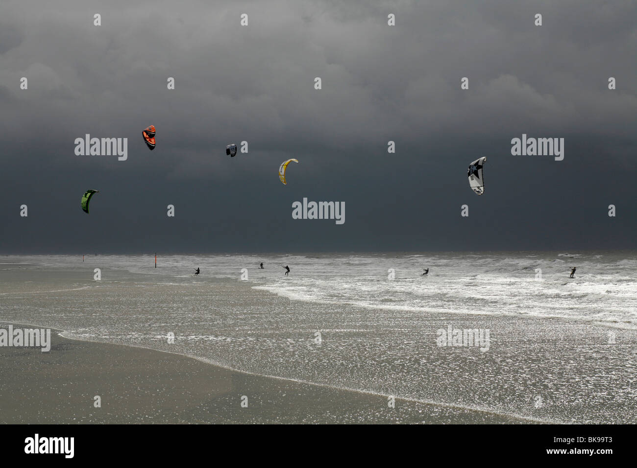 Kitesurfing during a storm on the North Sea, St. Peter Ording, Schleswig-Holstein, Germany, Europe Stock Photo