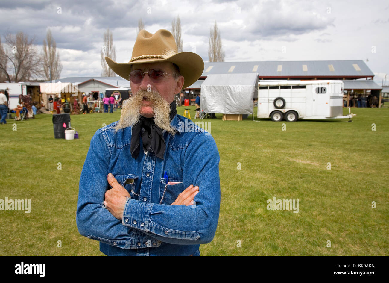 A cowboy wearing a long mustache at a county fair in Madras, Oregon Stock Photo