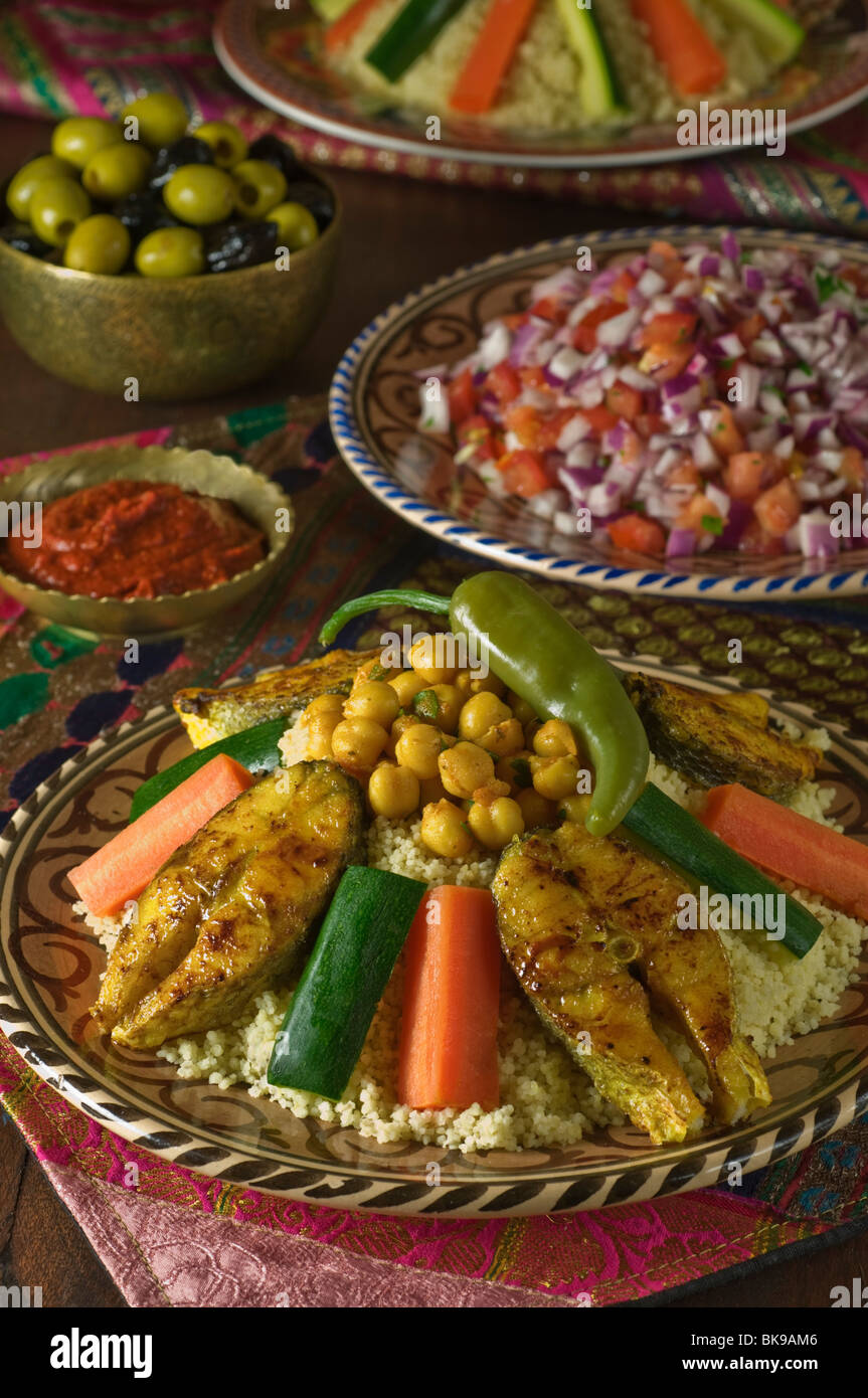 Couscous with fish and salad Tunisia Food Stock Photo