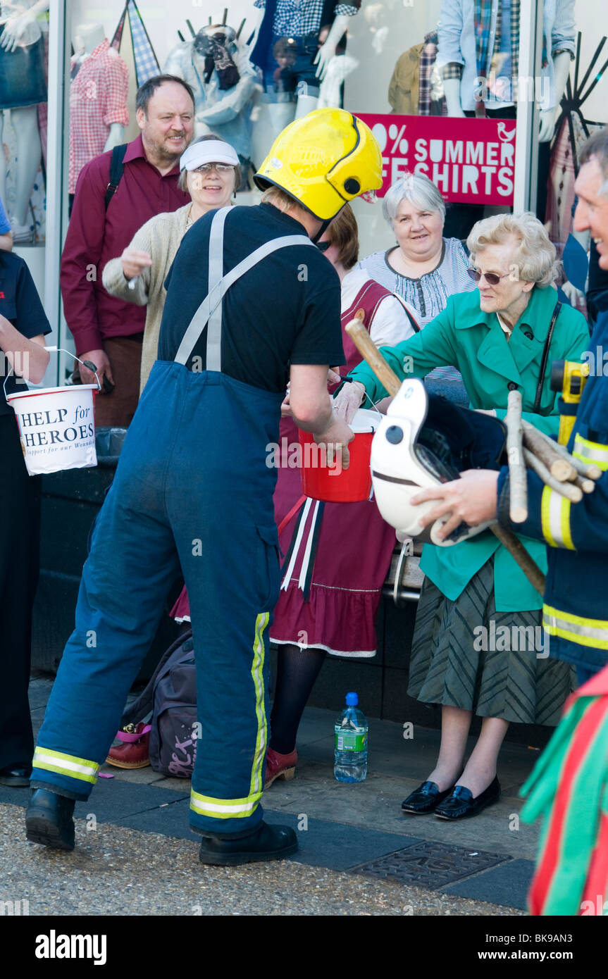 A fireman collecting money for Help the Heroes campaign at the Oxford Folk Festival Stock Photo