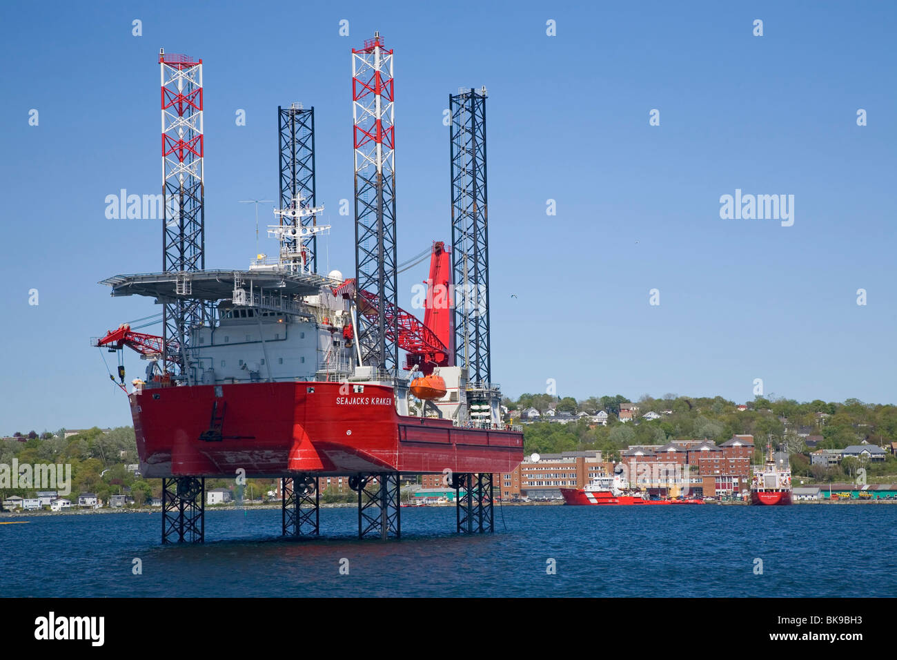 In Halifax Harbour, Nova Scotia is a jack-up offshore accommodation vessel, the Seajacks Kraken prior to leaving to the offshore Stock Photo