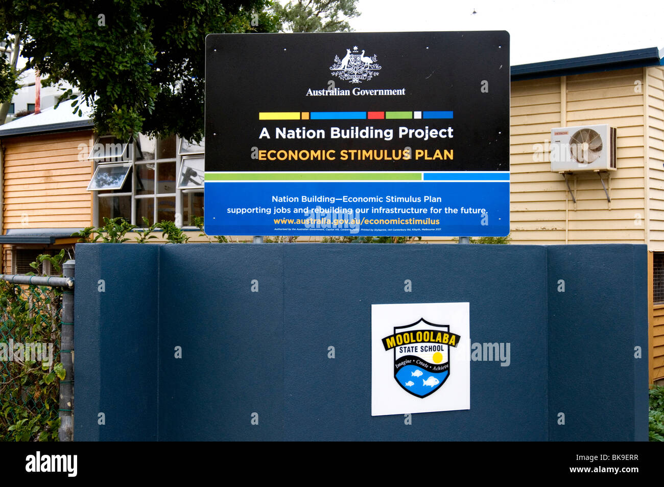 Sign at a primary school in Queensland, Australia, announces works funded by the federal government's Economic Stimulus Plan Stock Photo