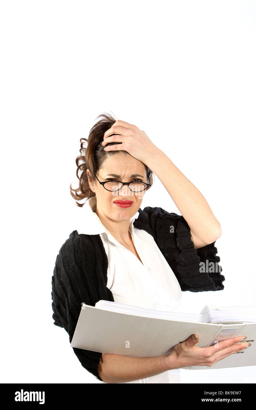 A young woman - business or student is stressed with a folder / directory in the hands Stock Photo