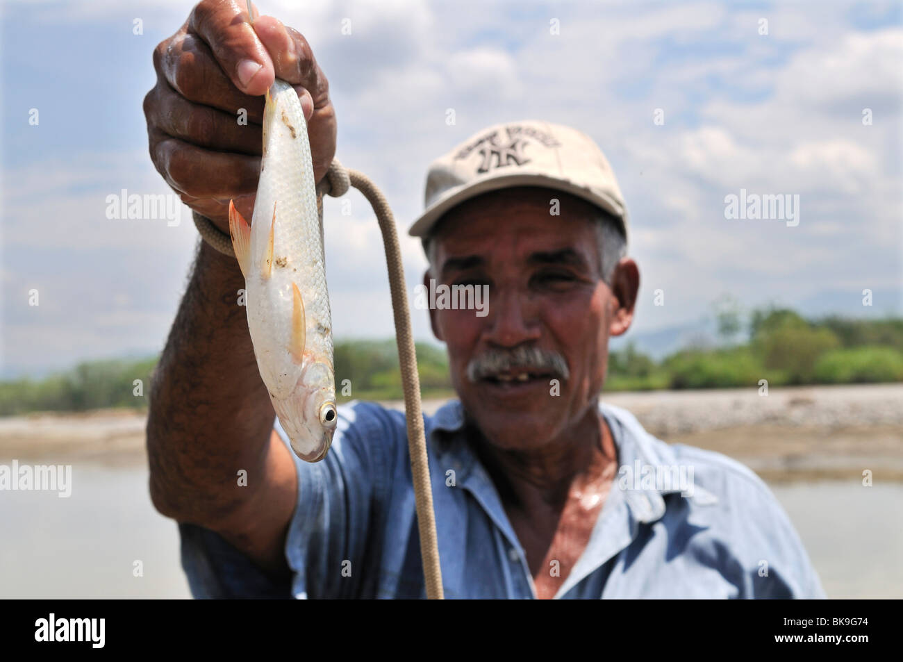 Fisherman on the Rio Magdalena River, La Dorada, Caldas, Colombia, South America Stock Photo