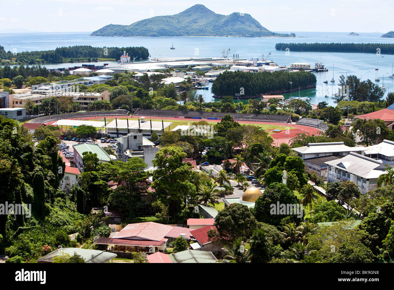 View from Bel Air towards the capital city of Victoria and the stadium, at back the islands St. Anne, Ile au Cerf, Ile Moyenne, Stock Photo