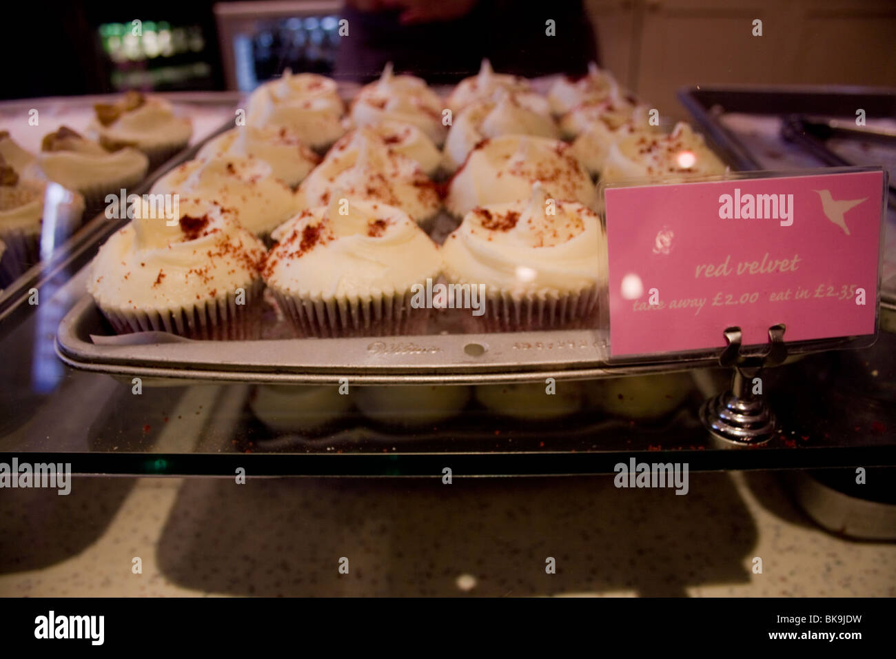 Cupcakes displayed in Hummingbird Bakery window, South Kensington