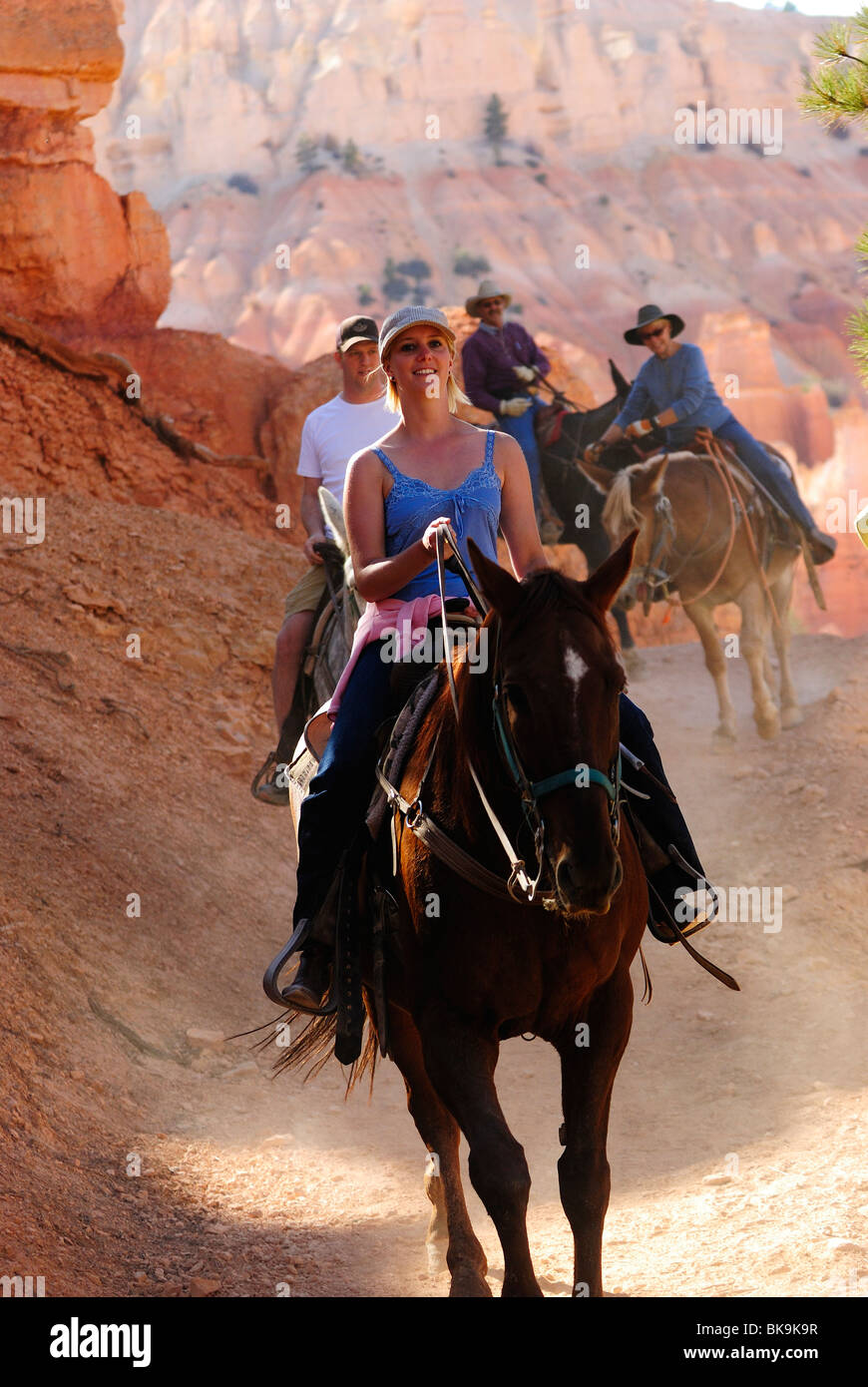People riding horses on Peek a boo loop trail in Bryce Canyon, Utah