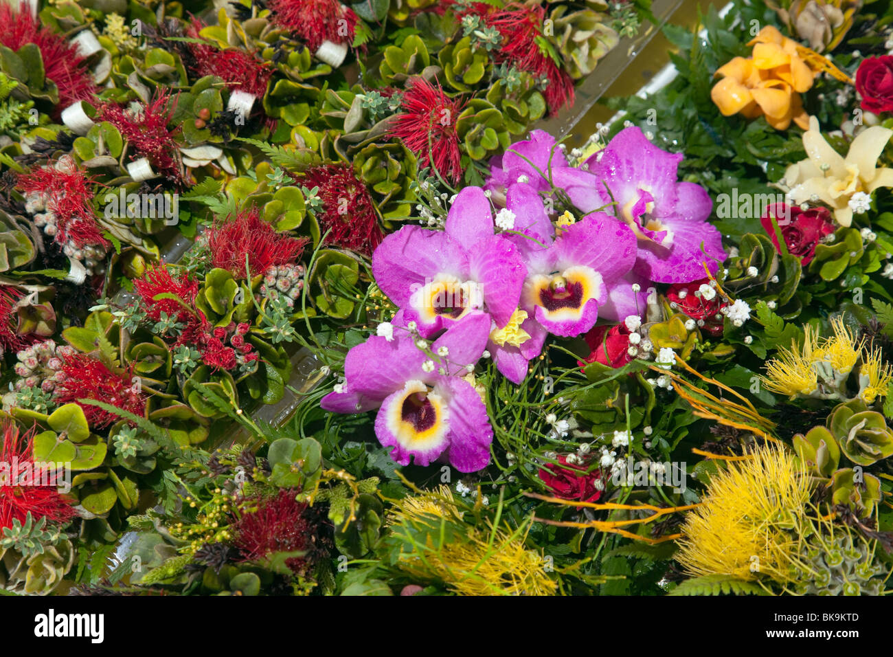 Floral leis and haku ready for sale by vendors at Merrie Monarch Festival in Hilo, Hawaii. Stock Photo