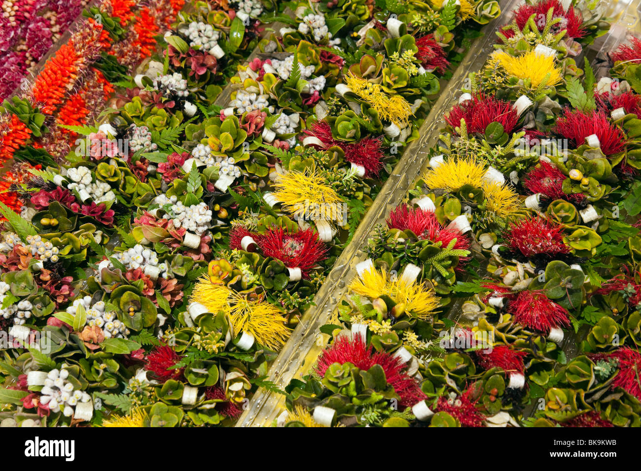 Floral leis and haku ready for sale by vendors at Merrie Monarch Festival in Hilo, Hawaii. Stock Photo