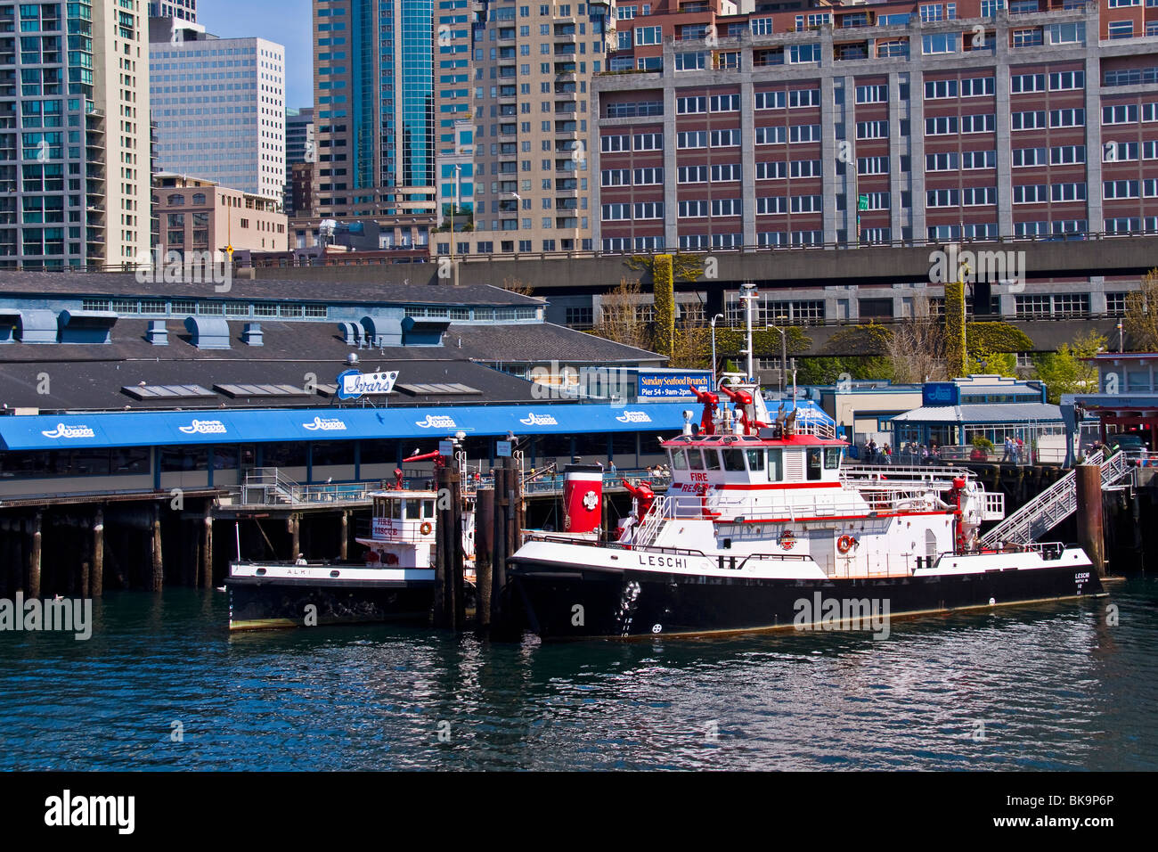 Alki and Leschi fire boats moored on waterfront, Seattle, Washington Stock Photo