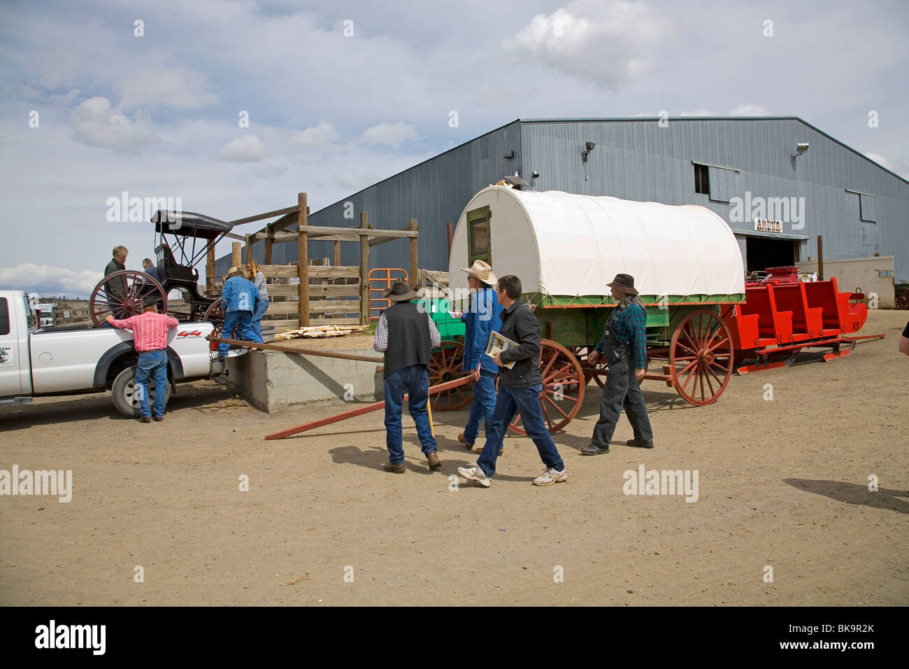 Old Time Ranchers Visitors and local ranchers at an old time wagon and buggy display at a ...