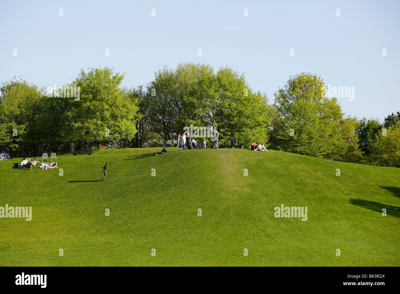 Meadow and hill in the Britzer Garten park in Berlin, Germany, Europe Stock Photo