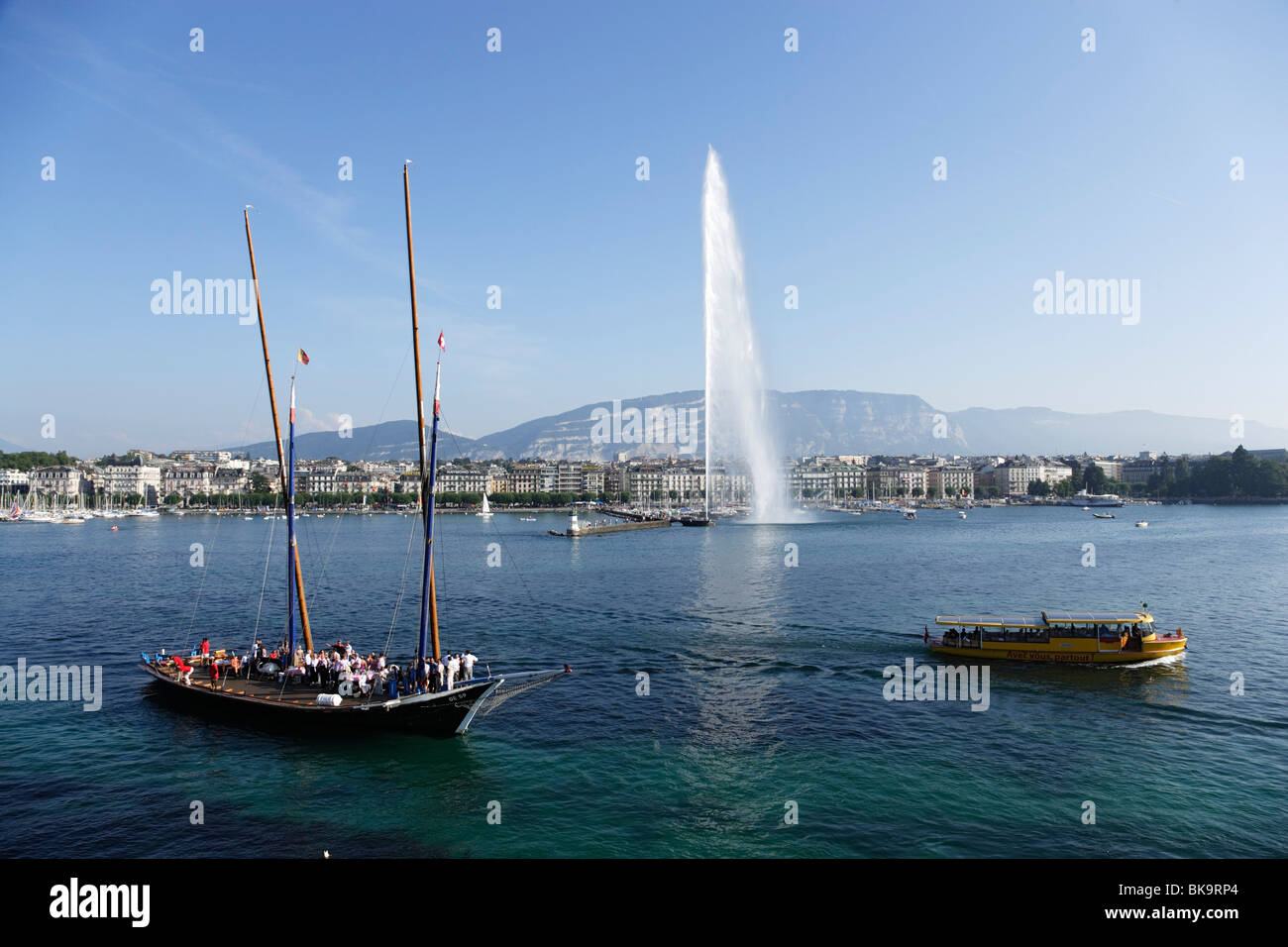 Traditionell Cargo sailer and Jet d'Eau (one of the largest fountains in the world), Lake Geneva, Geneva, Canton of Geneva, Swit Stock Photo