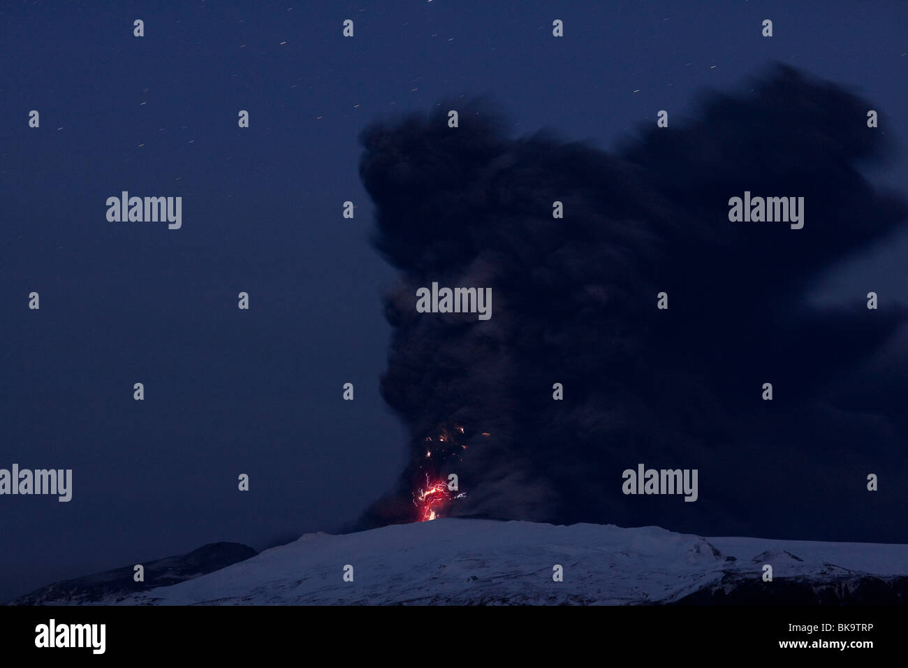 Volcanic eruption in Eyjafjallajokull, Iceland  and bolt of lightnings Stock Photo