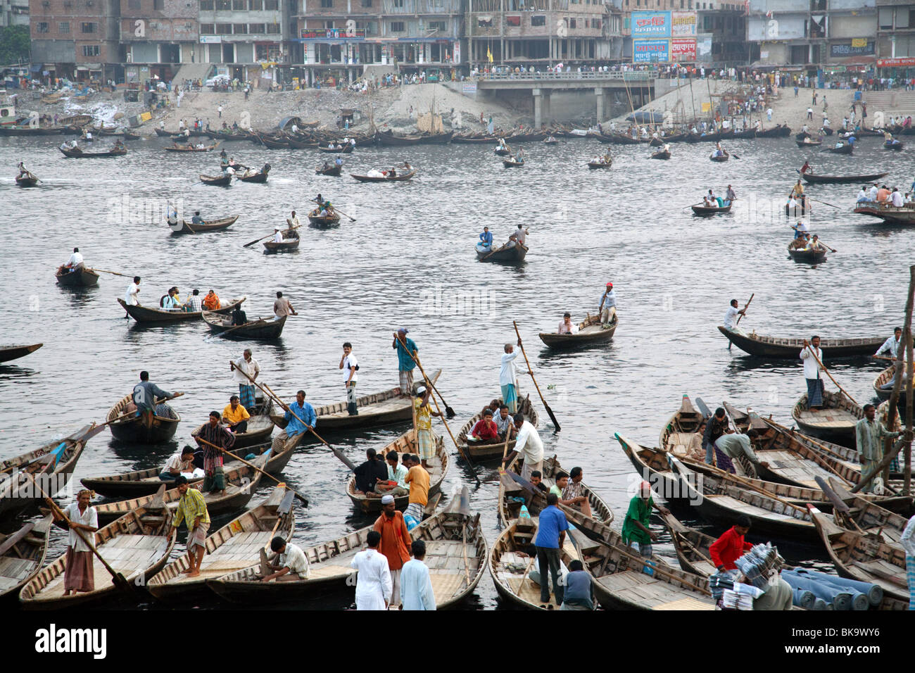 Boats on Buriganaga river in Sadarghat area of Dhaka, Bangladesh. Stock Photo