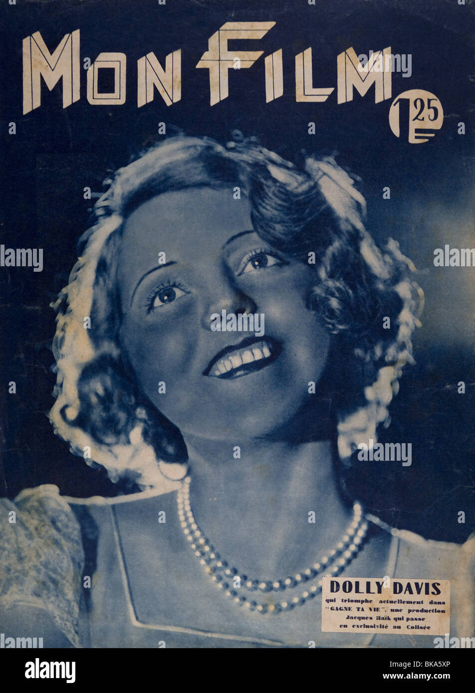 Dolly Davis French actress in  'Gagne ta Vie' 1931 Cover of Mon Film magazine Stock Photo