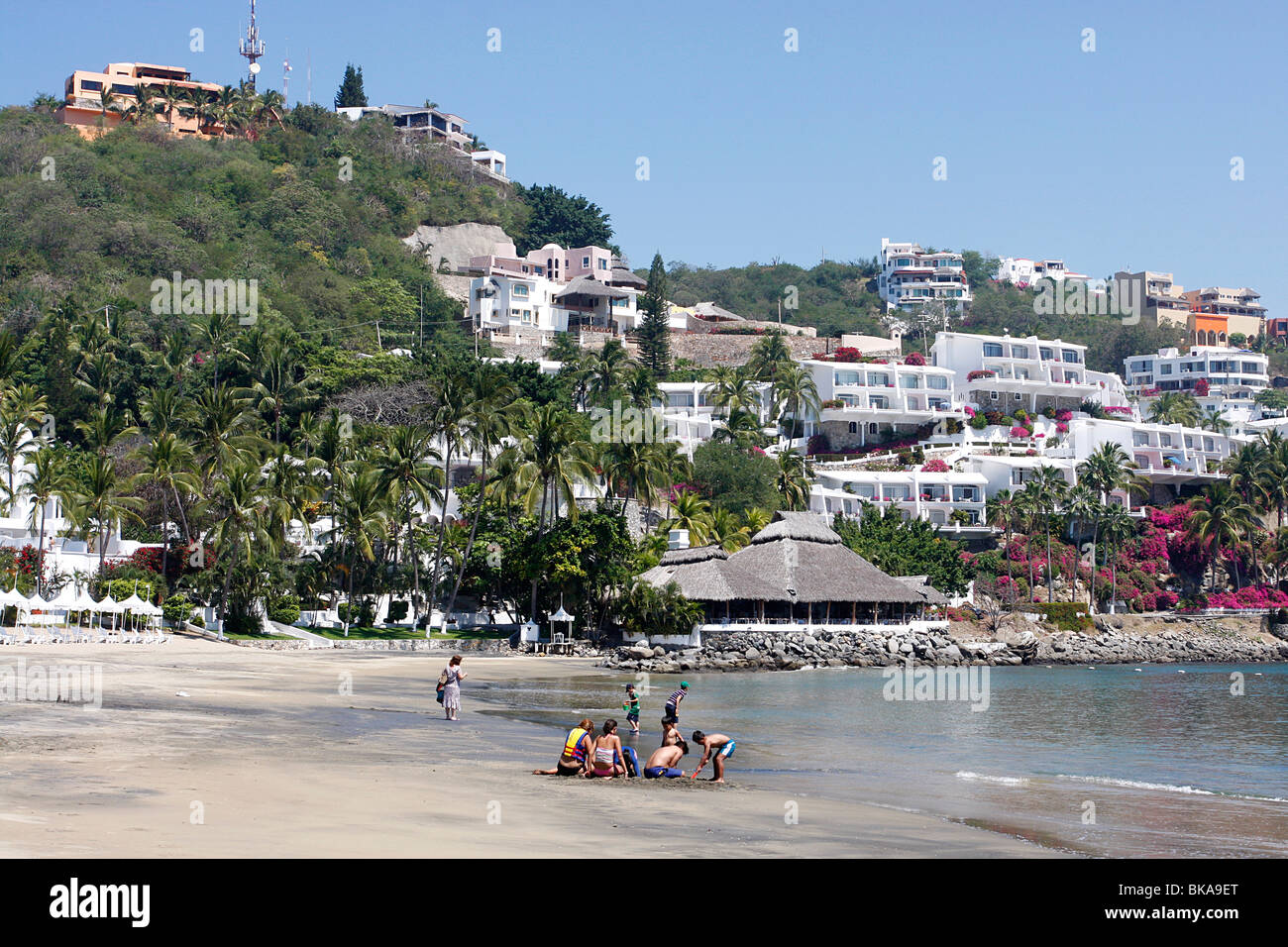 Sandy holiday beach at the famous beach resort of Manzanillo,Mexico. Stock Photo
