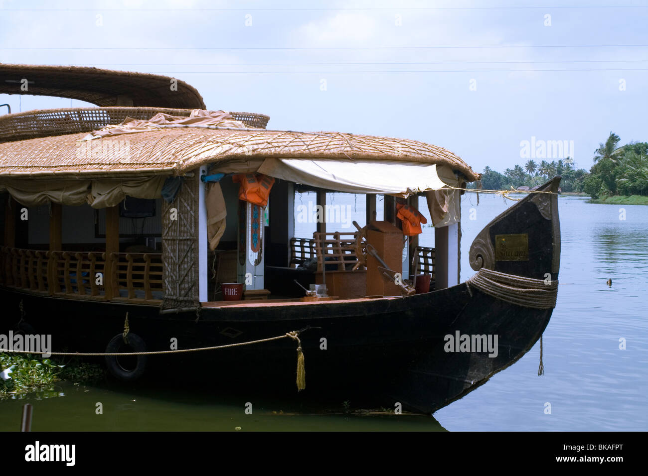 Closeup of a kerala houseboat tied up by the river side Stock Photo
