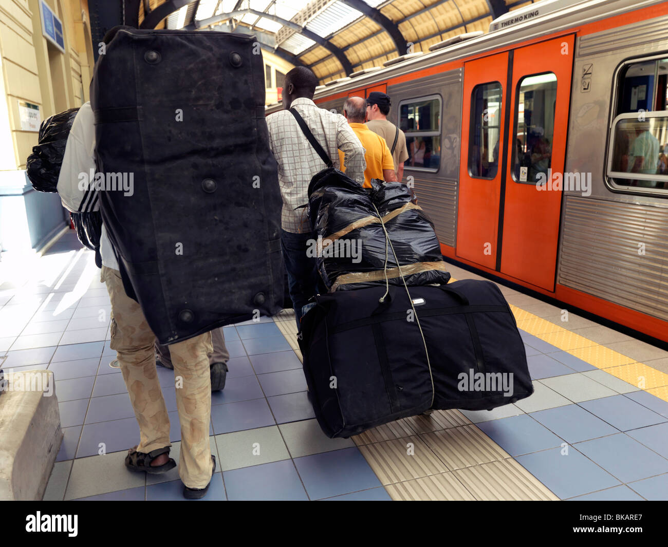 Piraeus Athens Greece Men Carrying Luggage At Railway Station Stock Photo