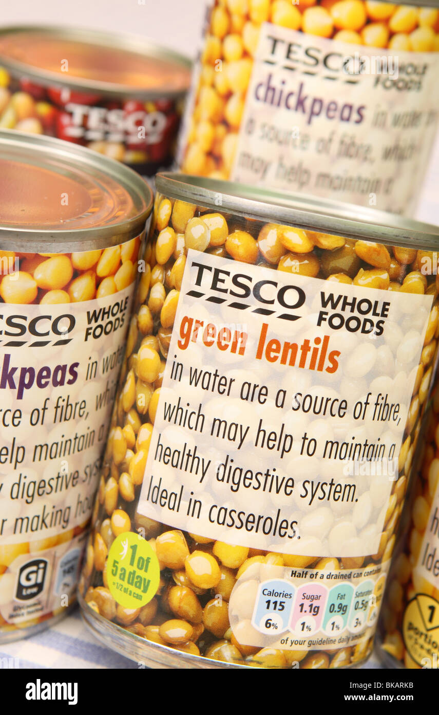 Green Lentils tin can whole food foods Tesco label Stock Photo