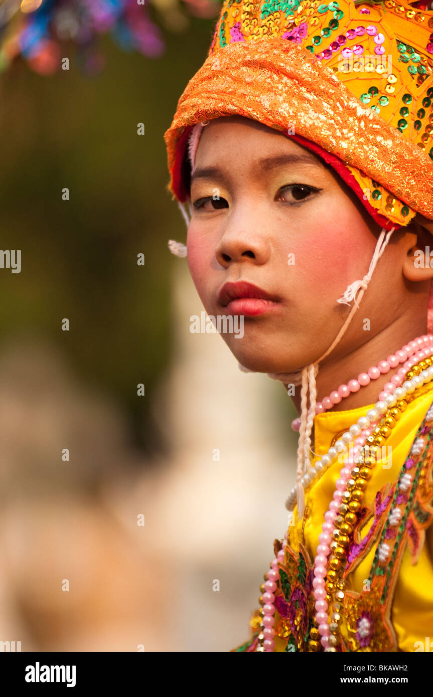 Young boy of the Shan people from Burma about to become a novice monk during a ceremony in Chiang Mai, Thailand. Stock Photo