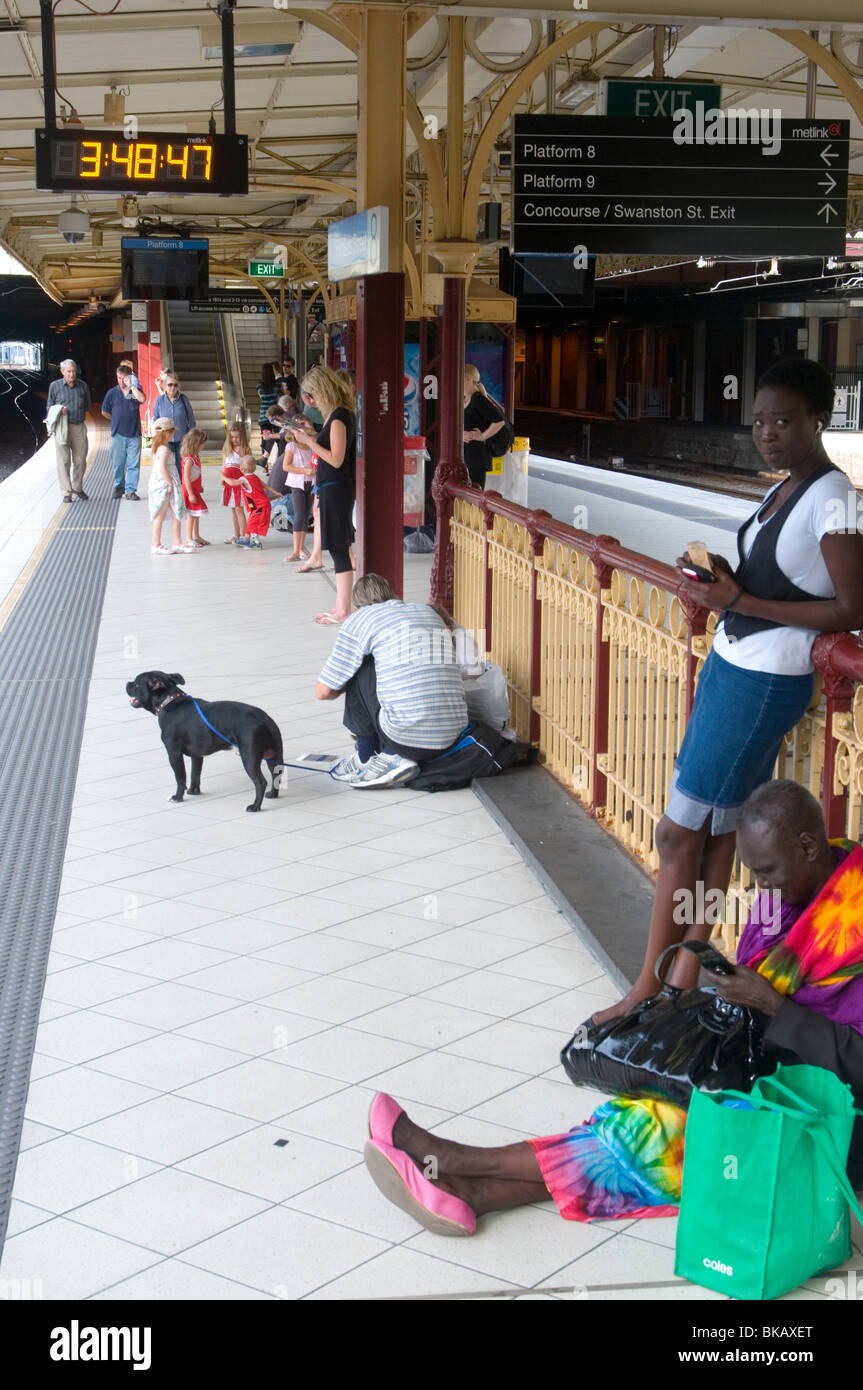 Passengers waiting for train hi-res stock photography and images - Alamy