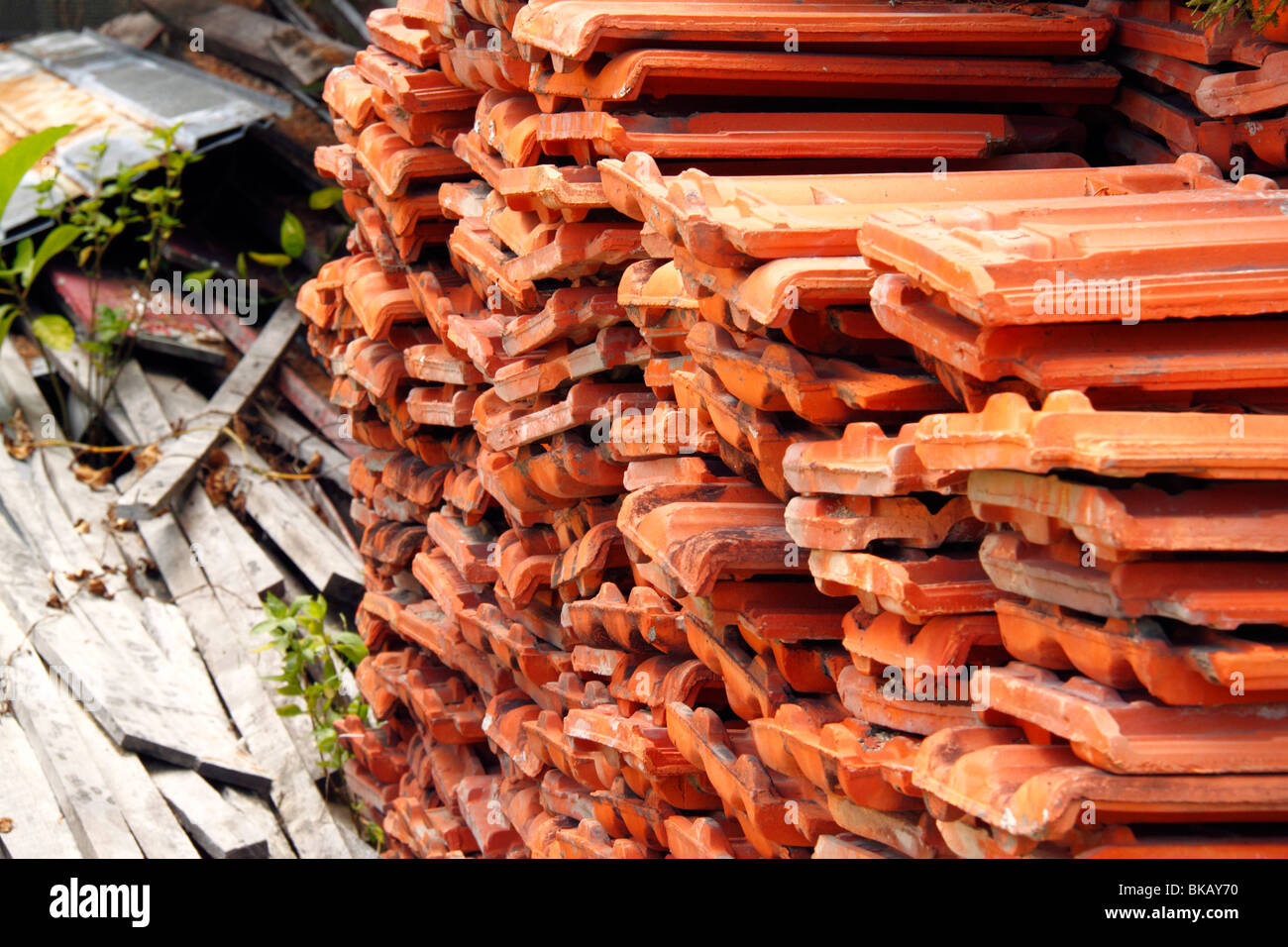 A stack of roof tiles at a construction site Stock Photo Alamy
