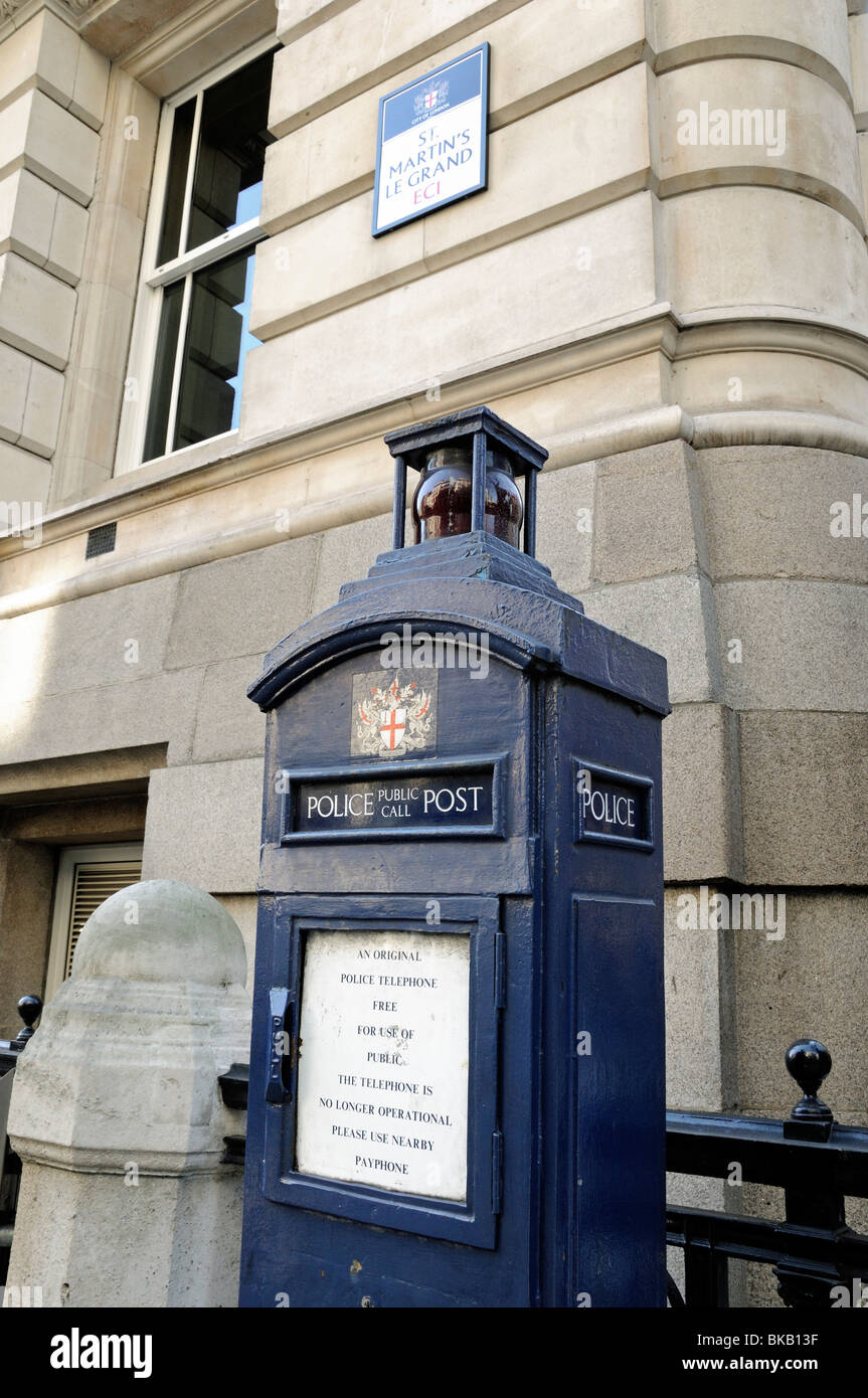 Old blue Police Public Call Post or original police telephone in St Martin's Le Grand City of London England Britain UK Stock Photo