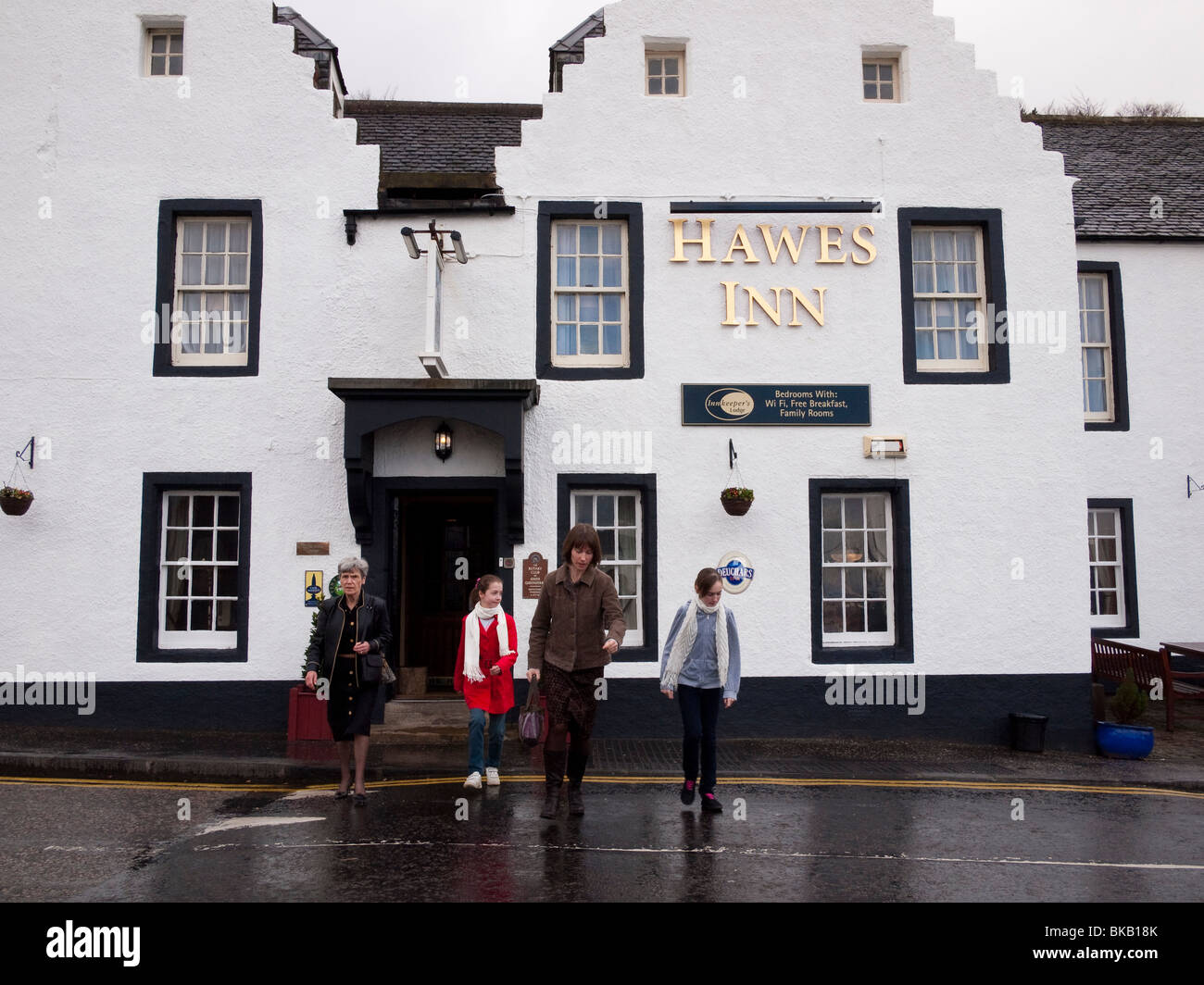 People Leaving the Hawes Inn, South Queensferry, Scotland Stock Photo