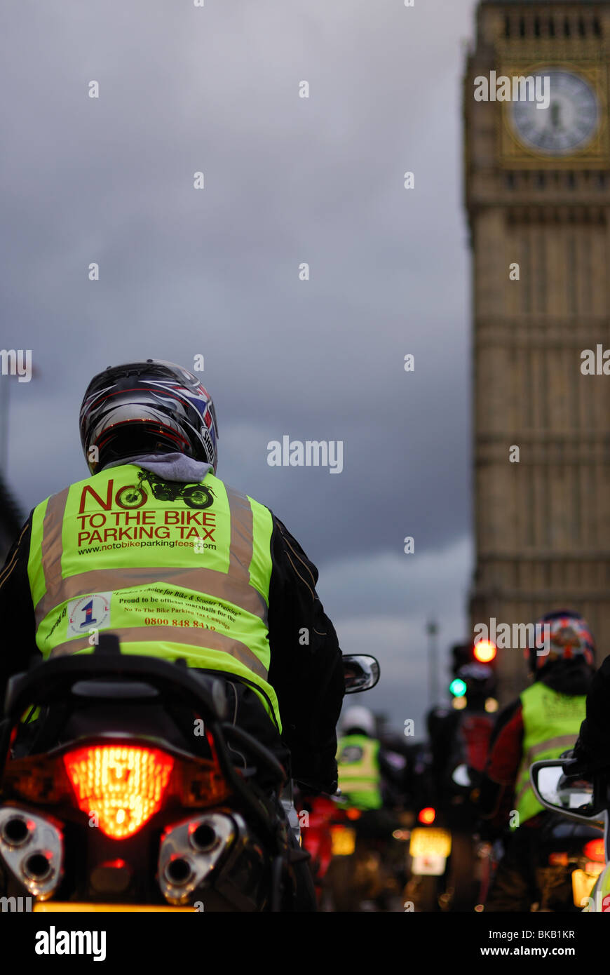 A biker against Westminster council's bike tax waits for others to gather before proceeding to Northumberland Avenue. Stock Photo