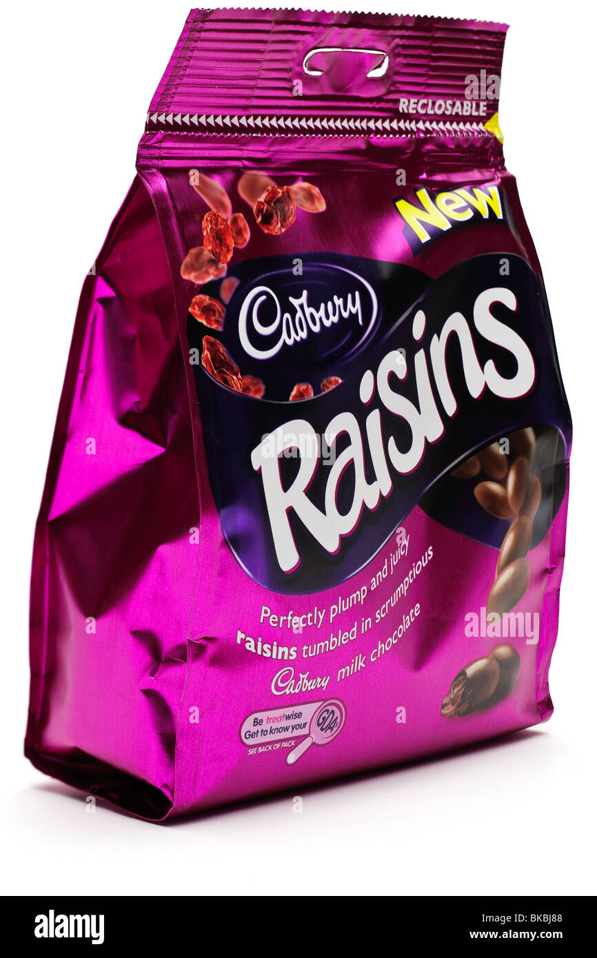 Bag of New Cadbury's milk chocolate covered raisins Stock Photo