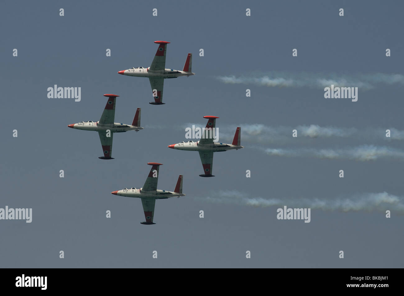 4 Tzukit also Fouga CM 170 Magister jet trainers of the Israeli Air Force aerobatic team flying in formation during Independence day in Israel Stock Photo