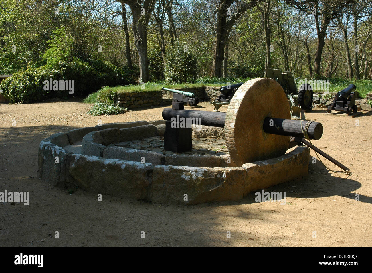 The apple mill or cider press in La Seigneurie Gardens Sark Channel Islands April Stock Photo