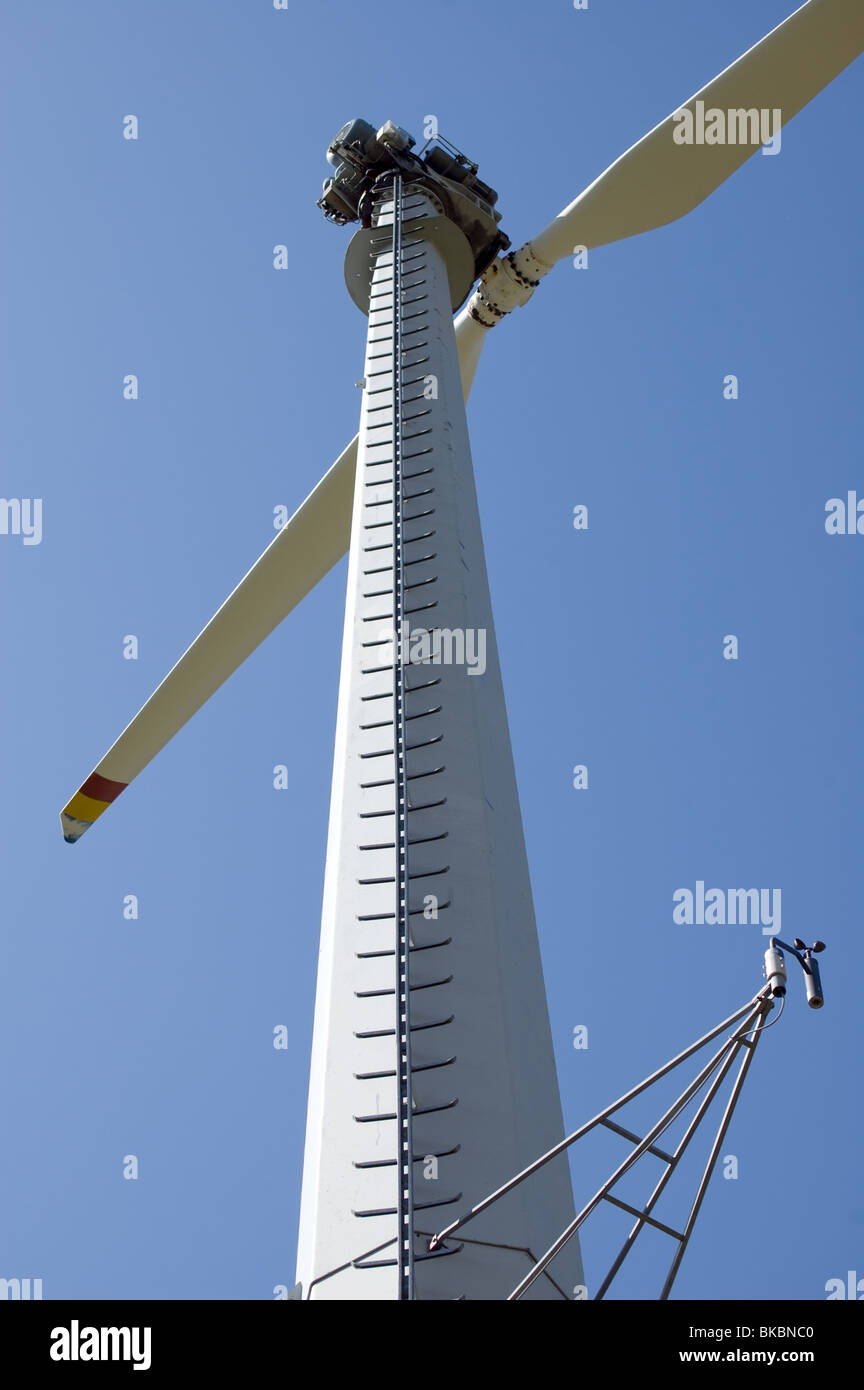 An high mountain wind turbine, pillar, ladder, anemometer Stock Photo