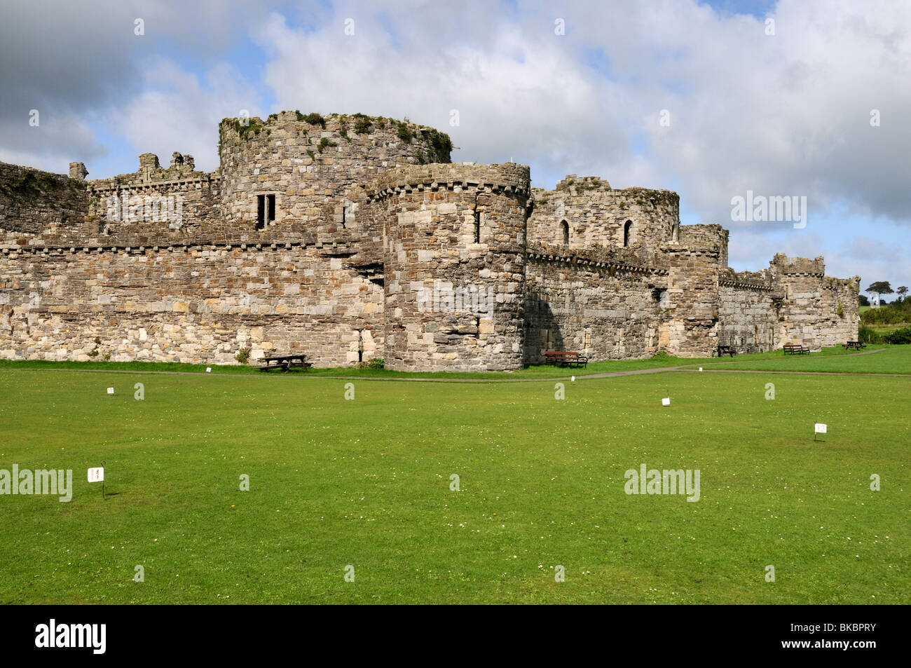 The well preserved ruins of historic Beaumaris Castle standing proudly ...