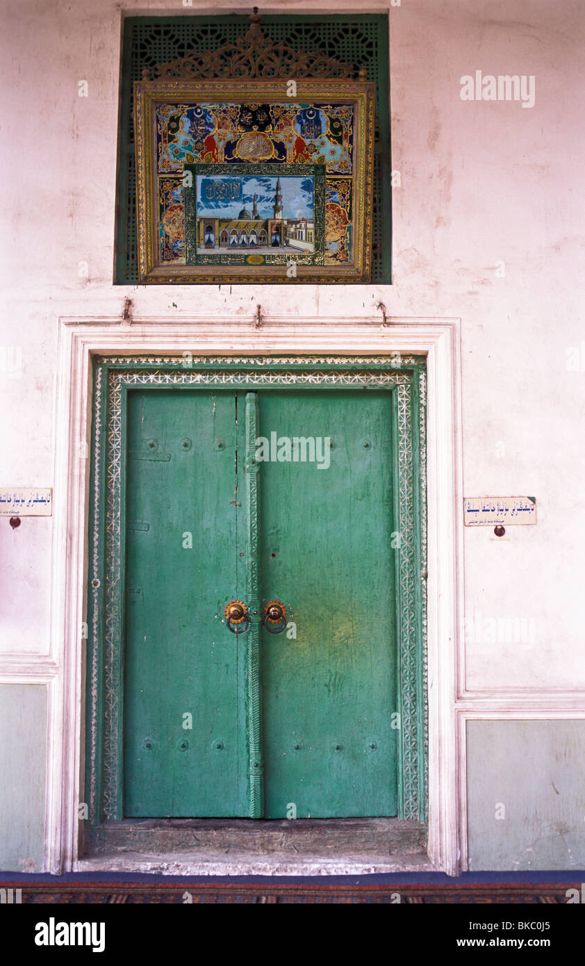 The double leaf door which connects the outer from the inner prayer galleries of the Id Kah Mosque, Kashgar city. Stock Photo
