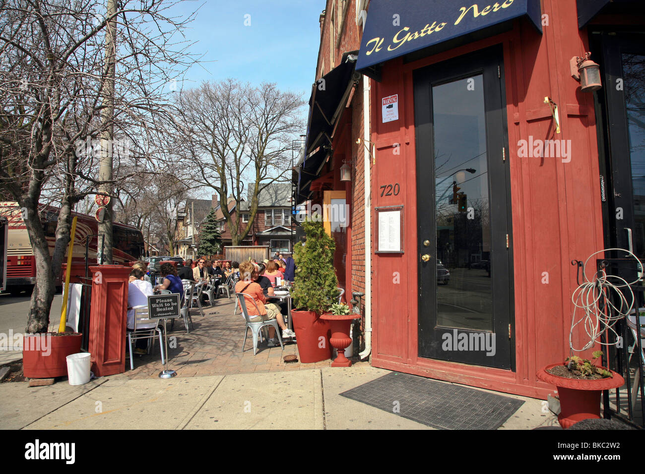 Outdoor restaurant/café in the neighborhood of 'Little Italy'on College Street in Toronto,Ontario,Canada,North America Stock Photo