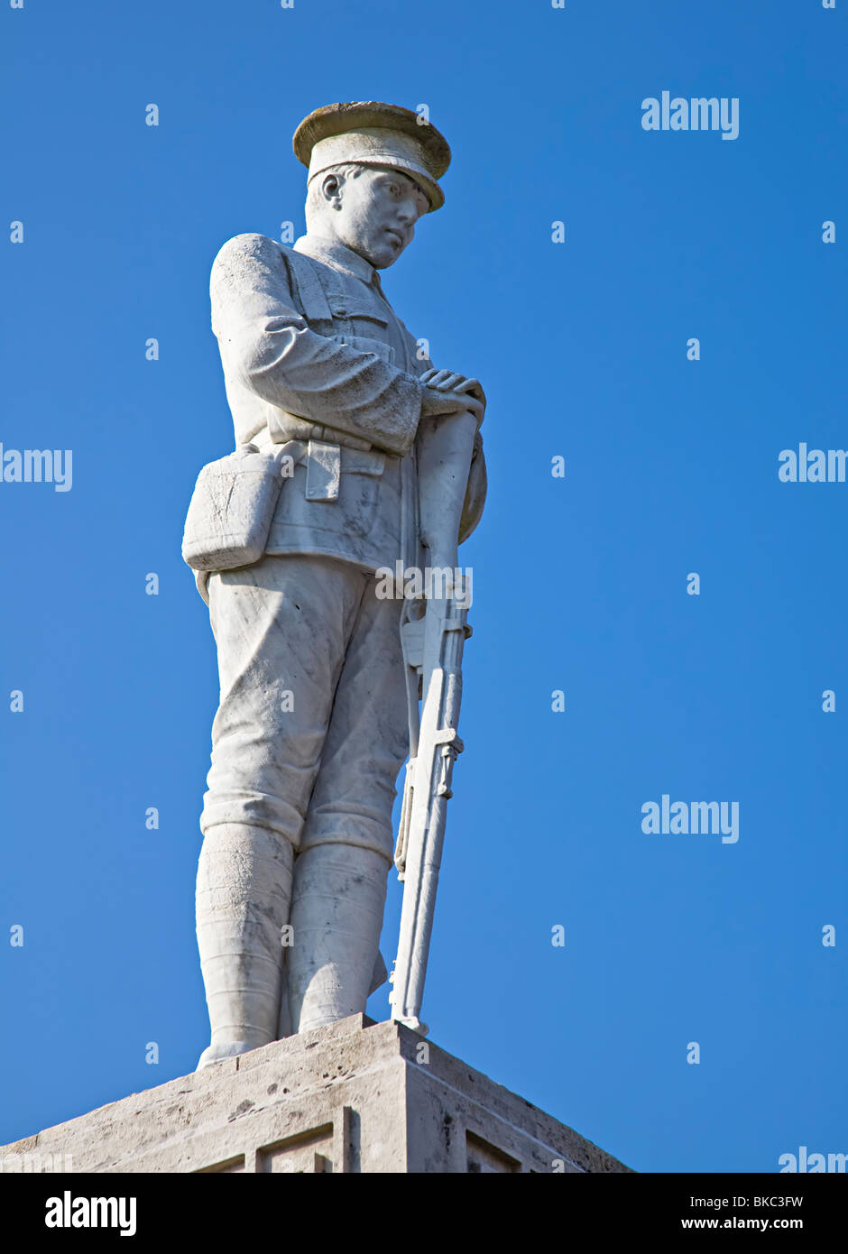 Statue of First World War soldier on war memorial Kidwelly Wales UK Stock Photo