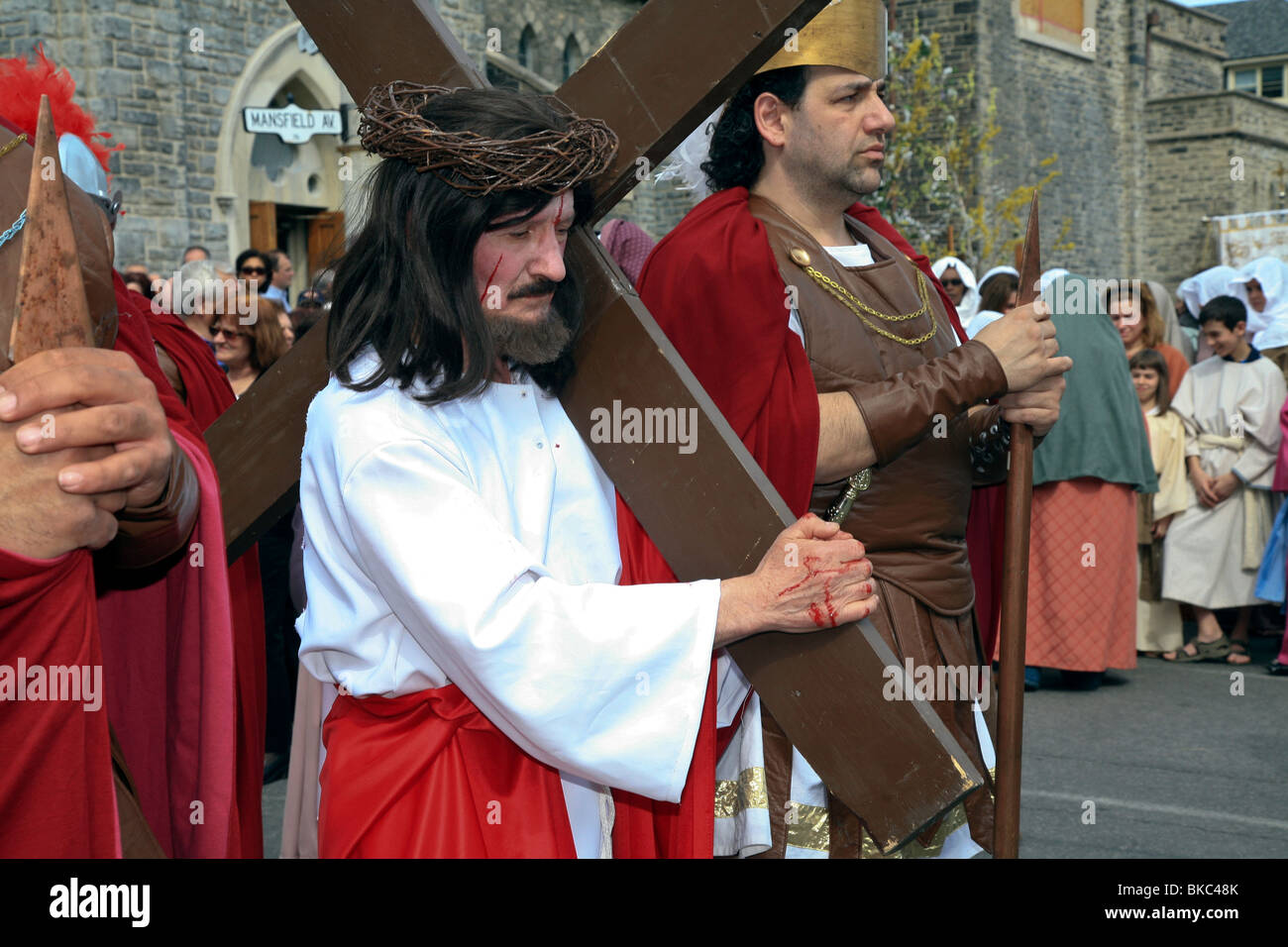 Jesus carries the cross at Holy Easter or Good Friday Procession Parade,' Little Italy', Toronto,Ontario,Canada,North America Stock Photo