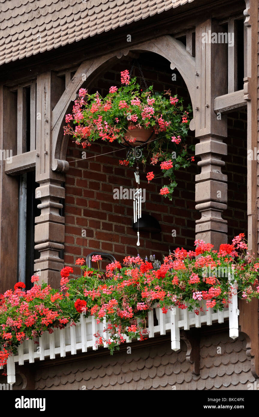 Balcony with geraniums Stock Photo