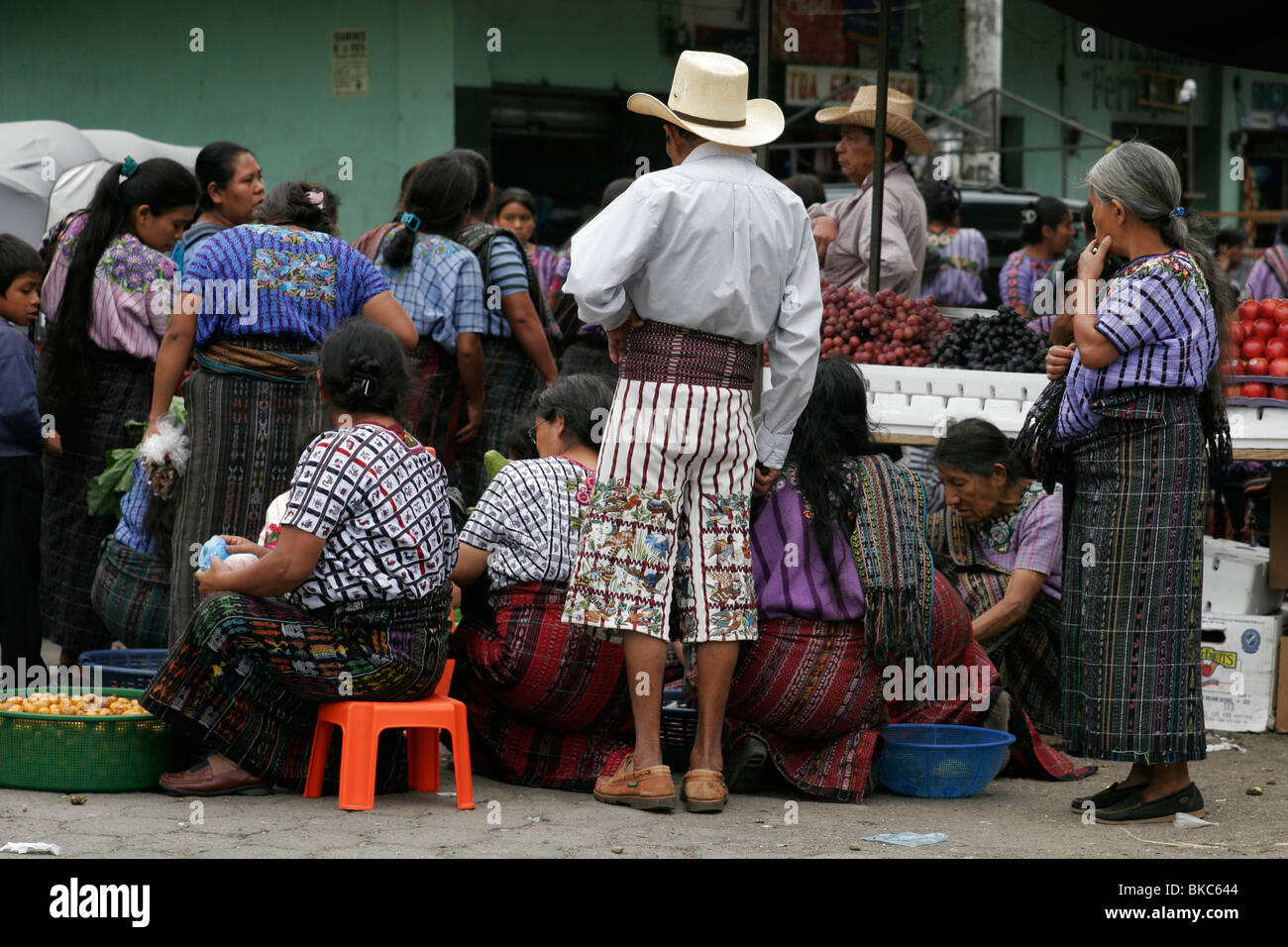 Tzutuhil Maya people dressed in traditional clothes on the market in Santiago Atitlan, Lake Atitlan, Guatemala, Central America Stock Photo