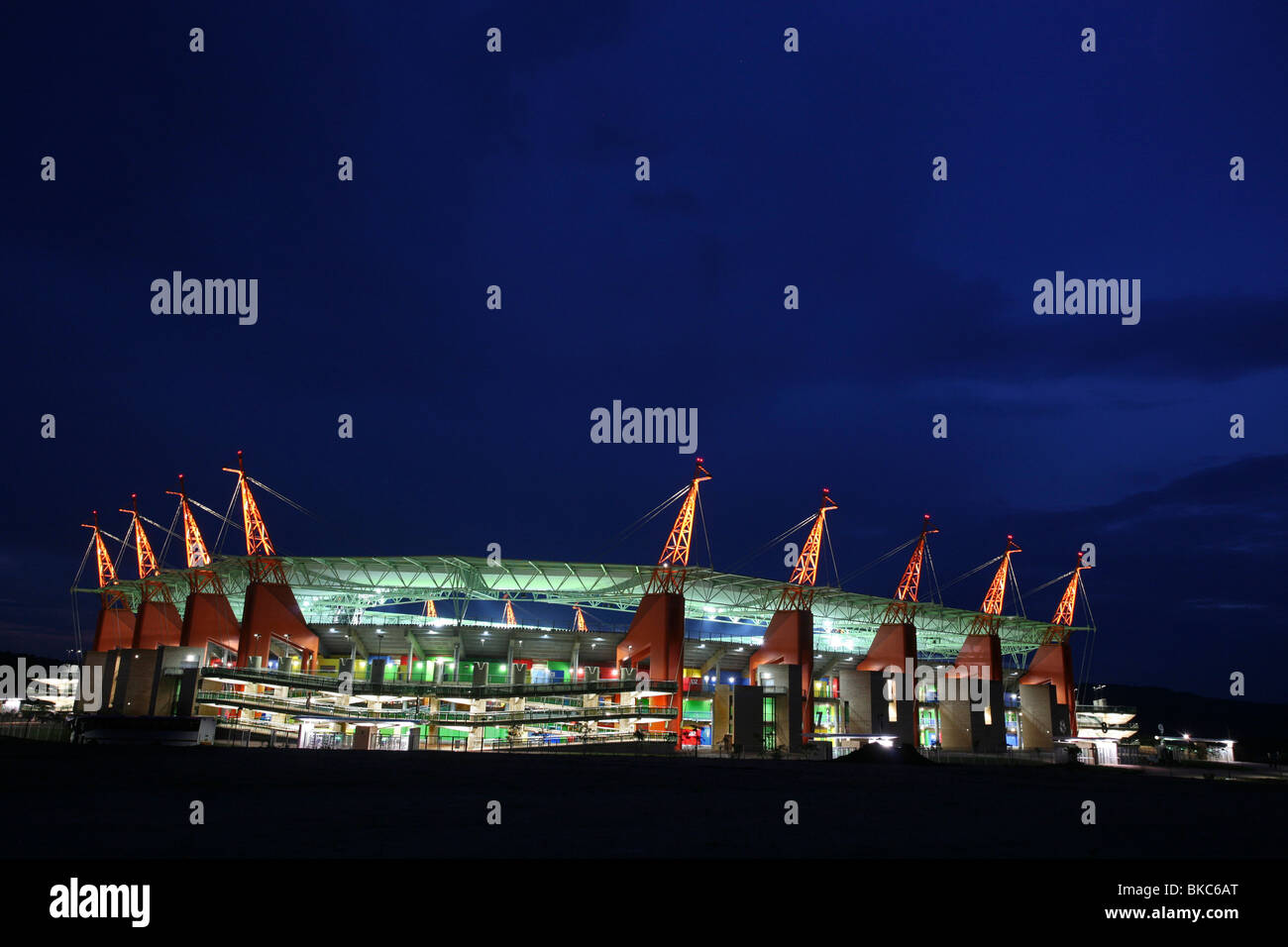Mbombela stadium at night showing the giraffe-like structures holding up the roof Stock Photo