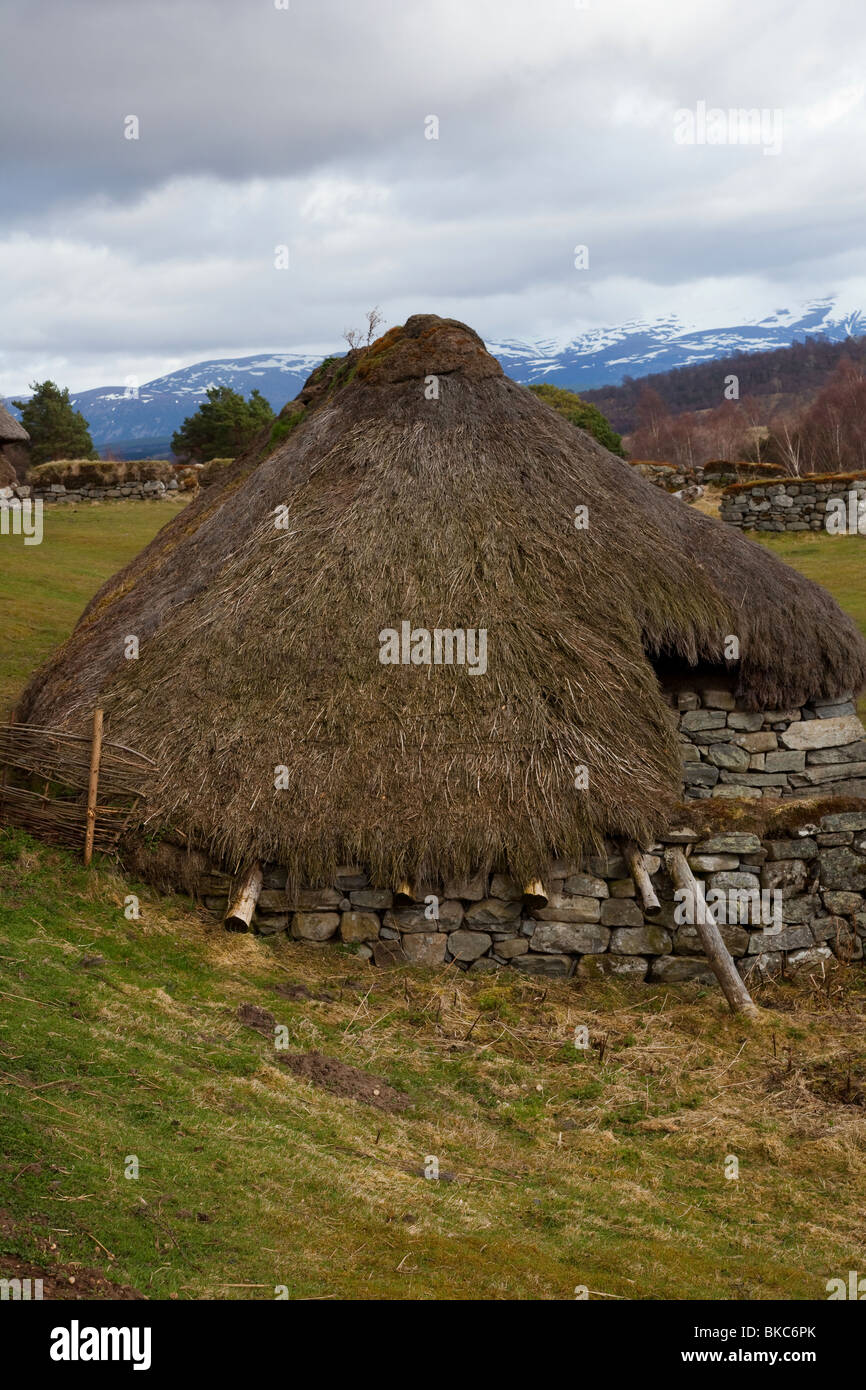 Rural ancient round thatched. circular old house, Baile Gean (Township) Highland Folk Museum, Visitor Attraction, Newtonmore, Speyside, Scotland, UK Stock Photo