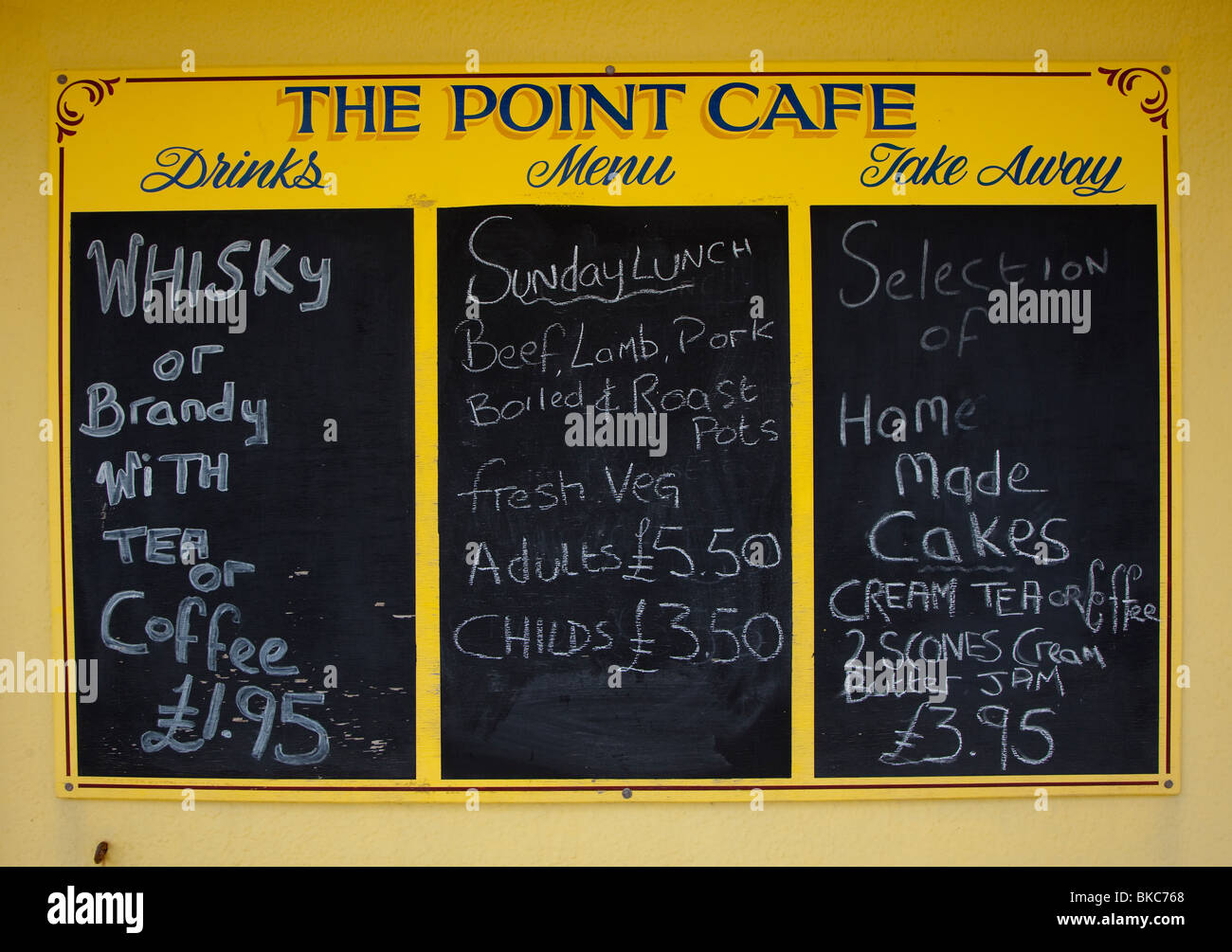 Chalkboard menu prices for drinks and food the Point Cafe Pendine Wales UK Stock Photo