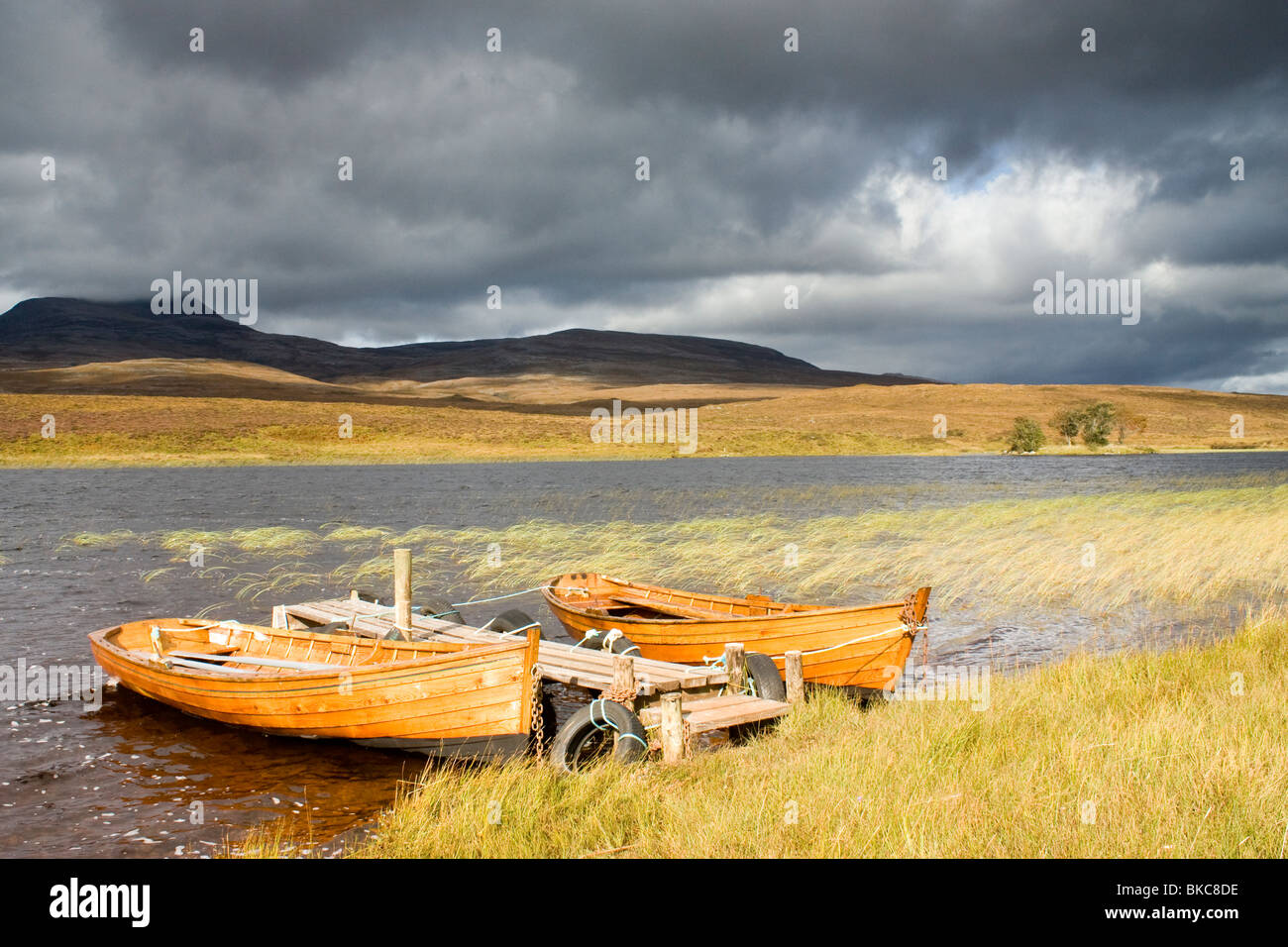 Landscape picture of trout fishing boats on Loch Awe, Ross Shire